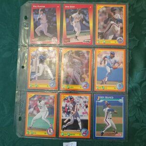 Nine baseball cards in sleeve in great condition from the 90s